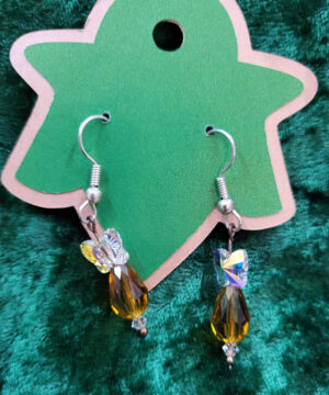 ButterflyDropYellow A pair of drop earrings made of an iridescent clear butterfly bead and a clear golden teardrop.