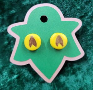 DeltaStudCommand Round yellow stud earrings with gold Star Trek 'Delta' symbols, approximately 1cm.